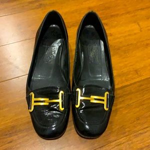 Ferragamo flats in black patent leather